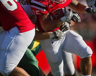 Geoffrey hauschild|The Vindicator.during the first quarter of a game at Youngstown State University's Stambaugh Stadium on Saturday evening.
