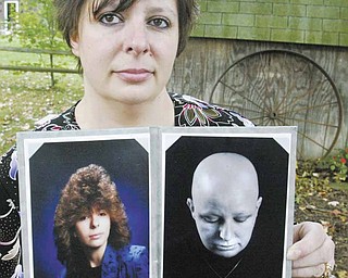 Breast-cancer survivor Heather Kish of Warren holds two photos of herself. The photo at left is from her senior year of high school, and the one at right was taken during her six months of chemotherapy treatment.
