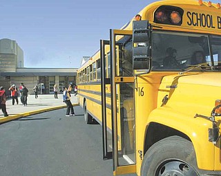 Students board buses at Campbell Middle School