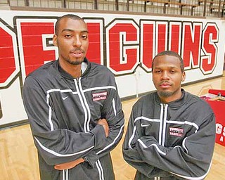 After watching last season from the bench, former Warren Harding High teammates Damian Eargle, left, and Sheldon Brogdon will be counted on to contribute to Youngstown State this winter.