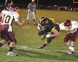 FOOTBALL - (28) Andrew Mayer gets past (33) Alex Dickey for a touchdown Friday night at Crestview. - Special to The Vindicator/Nick Mays