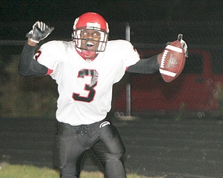 William D. Lewis|The Vindicator Girard's Brandon Byrd reacts after catching a TD pass during 1 rst half action Friday at Campbell.