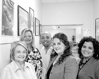 William D Lewis | The Vindicator: OCCHA committee members are, from left, Mary Isa Garayua, OCCHA executive director; Liz McGarry, OCCHA board member; Benito Velazquez Jr., OCCHA board president; Atty. Miriam Ocasio, OCCHA vice president and chairwoman of the gala, and Sara Cuevas, co-chairwoman of the gala.