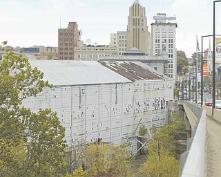 A look at the Wean United Building looking north from the Market Street bridge in downtown Youngstown. The city plans to seek $1.5 million from the state to clean up and partially tear down the building.