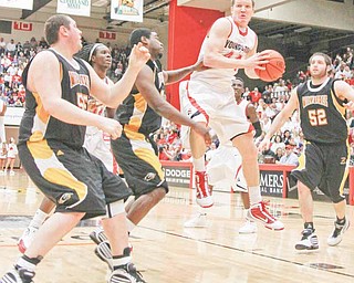 Vytas Sulskis (44) grabs a rebound during a game against Milwaukee on Jan. 24. Sulskis is one of just three returning players for the Youngstown State men’s basketball team this season.
