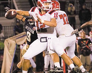 Youngstown State quarterback Kurt Hess (12) throws a pass during Saturday’s loss to Western Illinois in Macomb, Ill.