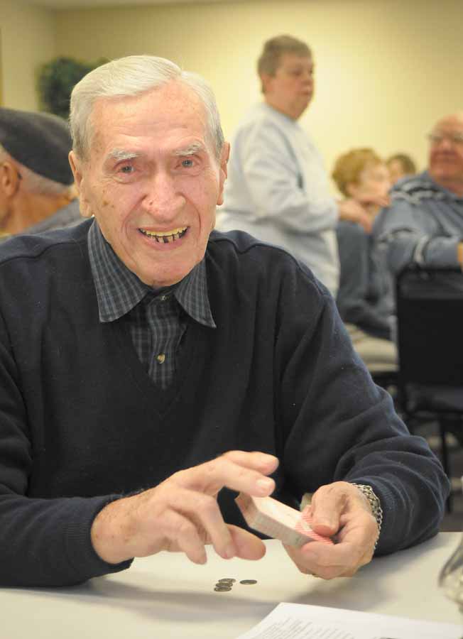 John Serenko of Austintown plays cards at the new Austintown Senior Citizen Center at 100 Westchester Drive.