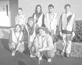 The clean team
Members of the Rotary Club of Austintown and of the Fitch Interact Club spent a recent Saturday morning cleaning up the Kirk Road area, from state Route 46 to Whispering Pines Drive. Among those participating in the 10-year-long project were, from left, front row, Rebecca Leonard, Sammi Devenport and Christine Holmes, and in back, Courtney Francis, Summer Tarr,  Brianna Traylor and David Dalvin. In cooperation with the Green Team the cleanup crew not only picked up the debris, but also separated the recyclable items from the trash. As a result they accumulated three bags of recyclables and ten bags of trash.
