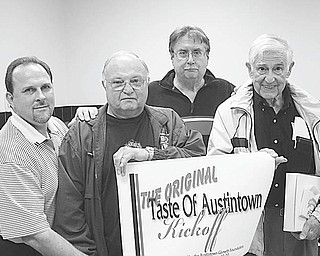Sign language: Austintown Growth Foundation is sponsoring a “Taste of Austintown” fundraiser as a benefit for various projects in the community. Displaying a sign announcing the kickoff of the event are, from left, David Ditzler, foundation president; Bill Sywy; Jack Sovik; and Art DePaolo. Austintown restaurants have donated gift certificates to be raffled off on Feb. 7. First prize will be $750 worth of gift certificates; second prize will be $500 worth of gift certificates; and third prize will be $250 worth of gift certificates. Tickets for the raffle are being sold for $5 each. For ticket information call Carol Fye at 330-792-8239.