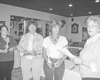 Serving the community: Officers who will guide the Girard Junior Women throughout 2010-11 were installed at a recent meeting at Amen Corner. Installed by Martha Altier, at right, were, from left, Bree Quesenberry, secretary; Roberta Lawrentz, president; and Debbie O’Brien, vice president. Also inducted in absentia was Melissa Malone, treasurer.  Anyone interested in joining the club is asked to contact Lawrentz at 330-545-6559. Meetings are the second Thursday of each month at an area restaurant.