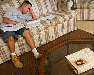 Geoffrey Hauschild|The Vindicator.6.29.2010.Resident Adam Freeman completes bible study work at OVTC.