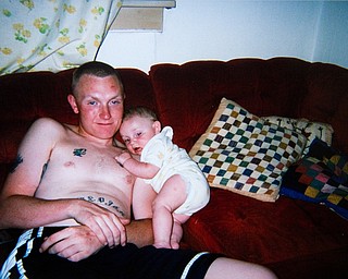 Anthony Sanders with his son in Aug. 2007.