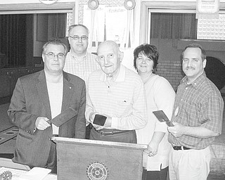 Rotary flips for fundraising: Struthers Rotary will be having its 55th annual pancake-and-sausage breakfast from 8 a.m. to 1 p.m. Nov. 7 at the Struthers High School cafeteria, 111 Euclid Ave. Since 1983, proceeds from the breakfast have provided college scholarships to local students. In that time, more than $70,000 has been awarded to graduating seniors. Tickets for the breakfast can be bought from any Struthers Rotary member or at the door. Tickets are $5 for adults and $3 for children under 12. Those working hard to make the breakfast possible are, from left, Anthony Quahliero; Tom Baringer, scholarship chairman; Paul Paris, a charter member who’s been flipping pancakes for more than 50 years; Wendy Noble, pancake chairwoman; and Bryan Higgins, president.
