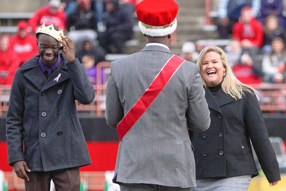 Youngstown's homecoming king, Richard Okello, and queen, Ashley Jones, are crowned during the homecoming halftime show at Stambaugh Stadium on Saturday afternoon.
