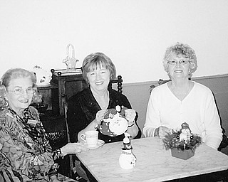 Eagerly awaiting guests for an upcoming tradition in Austintown are hostesses/committee members, from left, Rae Jeanne Mollica, Marge Goldner, and Joyce Pogany. Christmas High Tea, sponsored by the Austintown Historical Society, will be served Nov. 14 at Austintown’s National Historic Landmark, the Strock Stone House, 7171 Mahoning Ave. The public is invited, but reservations are a must and need to be made before Sunday. Seatings will be at noon, 2 p.m. and 4 p.m. The cost is $14 per person; $7 for children under 12. The menu includes coffees and a variety of teas, finger sandwiches, scones, pastries and extras that are served during a traditional High Tea. Bone china cups, saucers and dessert plates will complement the lace tablecloths. Free tours of the house will be conducted after each seating. Also included will be a basket raffle. All proceeds will benefit the historical society. Make checks payable to Austintown Historical Society and mail to 1181 S. Raccoon Road, Austintown, OH 44515.