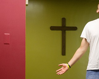 Geoffrey Hauschild|The Vindicator.6.7.2010 .Dennis McKenney prays during a daily chapel service at the OVTC center.