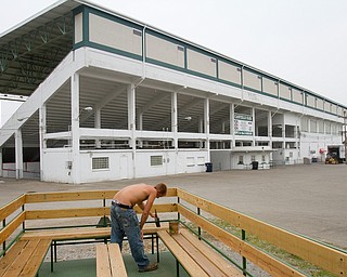 Geoffrey Hauschild|The Vindicator.7.28.2010.OVTC student Austin Henderson works at the Canfield Fairgrounds.