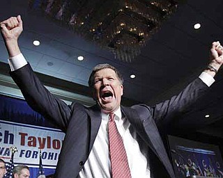 Ohio Gov.-elect John Kasich celebrates a victory during the Ohio Republican Party celebration, Wednesday, Nov. 3, 2010, in Columbus, Ohio. (AP Photo/Tony Dejak)