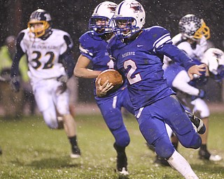 ROBERT K. YOSAY | THE VINDICATOR..Plenty of room to run as Reserves #2 Donnie Bolton breaks for a first down followed by #1 Ryley Sheptock during second quarter action. McDonald @ Western Reserve - first round .Ó--30-..