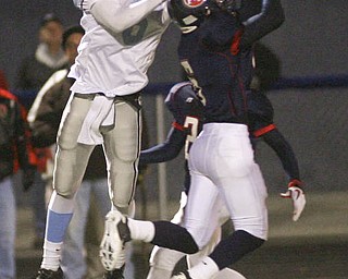 ROBERT  K.  YOSAY  | THE VINDICATOR --..six on six  as Falcons #6  Lucas Haupt - breaks up a pass intended for  the Rebels #6  Devyn Woods during second quarter action at First round of playoffs as Willoughby South Rebel at Austintown Fitch Falcons  ... -30-..(AP Photo/The Vindicator, Robert K. Yosay)