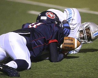 ROBERT  K.  YOSAY  | THE VINDICATOR --.. Fitches  #4  Larry  Vines breaks up a pass and almost intercepts from Willougby  #6  Devyn Woods  as First round of playoffs as Willoughby South Rebel at Austintown Fitch Falcons  . second quarter action--. -30-..(AP Photo/The Vindicator, Robert K. Yosay)