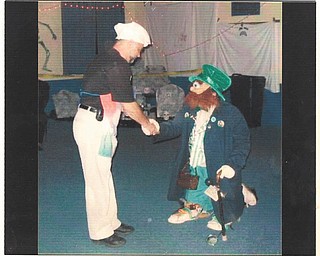 Bill Maine of Boardman has won more than $7,000 over the past 15 years he's been dressing up as a leprechaun. He said he passes out gold-covered chocolate coins to the ladies, who usually think he's a kid dressed up because he doesn't talk while in costume. Maines, who submitted this photo, is 75.