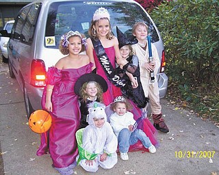 Carol Doll of Austintown said this photo she sent in is her favorite Halloween photo because it has all seven of her grandchildren in it. They are, front row, Arilyn Johnson and Breannah Johnson, and back row, Jennifer Doll, Deianira Johnson, Alyssa Johnson, Destiny Johnson (she and Deianira are twins) and Codey Johnson.