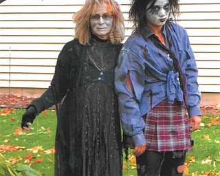 Dee and Lily Hockenberry of Boardman hang together as mother and daughter zombies.