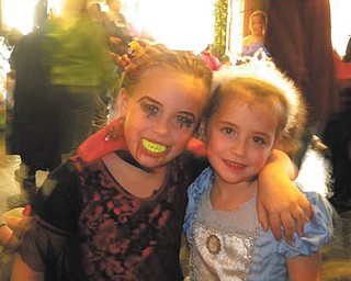 Friends Madalyn Smith and Anna Leshinsky of Boardman are ready for a howling good Halloween party. Photo sent in by Patty Hoover.