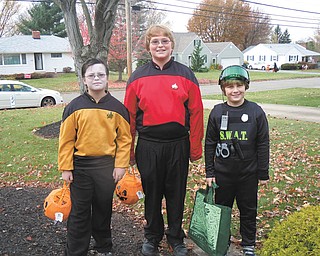 Matthew and Paul Featsent of Willowick and Jeremy Lodwick of Youngstown are at Great-grandma Vargo's house in Hubbard.