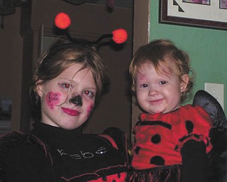 Sierra and Chelsea Campbell of Youngstown aren't bugged at all. Photo sent in by Christina Campbell..