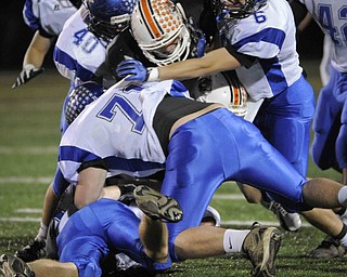 Lakeview defence surround Chagrin Fall's RB Jack Campbell during their game at Arura on friday night. Photo/Mark Stahl