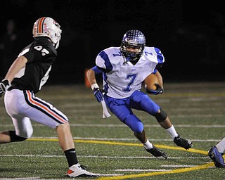 Lakeview's Toma Leveto, 7, tries to slip pasr Chagrin Fall's defenderKyle Weber, 45, during their game at Arura on friday night. Photo/Mark Stahl