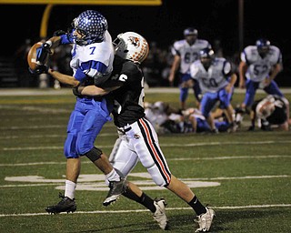 Lakeview's Toma Leveto, 7, goes up for a pass against Chagrin Fall' s Billy Cale, 26, during their game at Arura on friday night. Photo/Mark Stahl