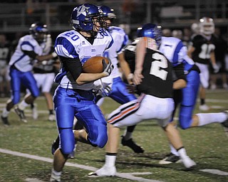 Lakeview's Louie Novakovich runs a kick back against Chagrin Falls during their game at Arura on friday night. Photo/Mark Stahl