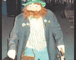 Bill Maine of Boardman has been dressing up as a leprechaun for 15 years. He got the idea from comedian Tim Conway, who stood in a hole but wasn't mobile. Not so for Maine, who dances to rock 'n' roll for a few hours each night as part of the performance. Normally, Maines is 5 foot, 8 inches tall, but when in costume, he's 4 foot tall.