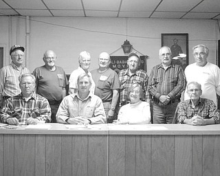Pulling for tractors: The Antique Tractor Club of Trumbull County recently elected new officers for 2011. They are, seated left to right: Terry Taylor, of Cortland, vice president; Joe Toth, of Champion, president; Marilyn Hanton, of Fowler, secretary; and Cornel Roscoe, of Mecca, treasurer. Standing, from left to right, are the trustees: Lee Silvernail, of Farmington; Don Murphy, of Bazetta, Tommie Tomlinson, of Diamond; Jim Potts, of Berlin Center, Pat Sutliff, of Johnston, Jim Schwartz, of North Bloomfield, and Ray Carr of Champion. The club is reorganizing and preparing for the new year. Upcoming events include the annual Christmas party for members on Dec. 3 at Gardenbrook Banquet Center in Cortland. To become a member call Toth at 330-240-6407 or Taylor at 330-637-8946.