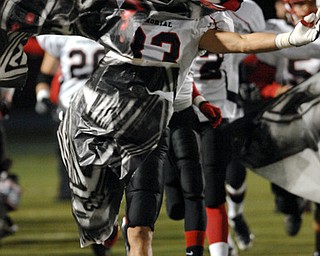 The Campbell High School Devil's run through a picture of Darth Vader with horns.