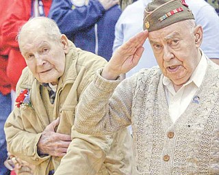 William D LEwis The Vindicator WWII vets Michael Kopanic, 92, left, and Allen Wolkoff, 91, during singing of the national anthem during a veterans day program at Liberty HS Thursday. Both are of Liberty and were with a group of Liberty vets honored.