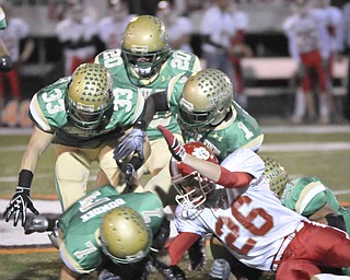 The Ursuline defence recover a blocked punt against Norwayne in the 1st half of their game at Green on Saturday night. Photo/Mark Stahl