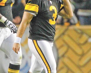 In this Nov. 14, 2010, file photo, Pittsburgh Steelers kicker Jeff Reed (3) reacts after missing a field goal in the third quarter of an NFL football game against the New England Patriots in Pittsburgh. The Steelers cut Reed on Tuesday, Nov. 16, 2010. He began the season as one of the 10 most accurate kickers in NFL history but has been erratic all season. (AP Photo/Keith Srakocic, File)