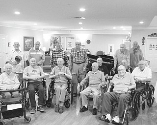 Victoria House Assisted Living honored its veterans with an evening social on Nov. 10. American Legion Post 301 presented each veteran with a card of thanks and performed a flag-folding ceremony. A wall honoring Victoria House veterans with pictures of the men and women in uniform was a highlight of the evening. Victoria House staff, residents and family members sang patriotic songs and paid tribute to each veteran. Victoria House has 16 veterans, representing the Army, Air Force, Navy and Coast Guard. Residents pictured are, front row, from left, Margaret Aiello, Joe Brunetti, Frank Carney, Jerry Sanchy, and Jack Finn; and, back, Ray Pugh, John Bagin, Doc Friedrich, Ed Enterline, Glenn Dinger, Jack Griffin, Paul McCann, Joe Sliman and Tom McCarthy.