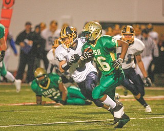 Ursuline’s Akise Teague heads downfield during the 2008 Division V regional final against Kirtland. Teague began to emerge for the Irish two years ago as a lightning-quick sophomore who could make plays as a  return man and a reserve running back behind then-starter Allen Jones. Now he’s a three-way standout for the state championship favorites in Division V, who will once again face the Hornets in Saturday’s regional final. Kirtland gave Ursuline its toughest test of the 2008 playoff s, nearly pulling off the upset before CB Dale Peterman’s last minute interception return for a TD gave the Irish an 18-17 win. Two weeks later, they won the first of their back-to-back state championships.