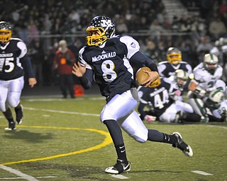 McDonald QB Matthias Tayala runs for the 1st TD of the game against Mogadore during their Div VI playoff game at Twinsburg on Friday night. Photo/Mark Stahl