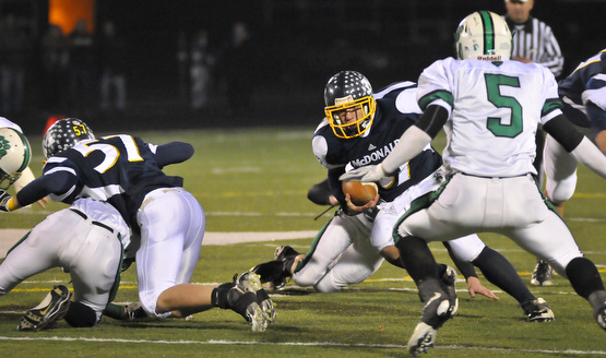 McDonald's Zach Tura rund the middle of the field against Mogadore during their Div VI playoff game at Twinsburg on Friday night. Photo/Mark Stahl