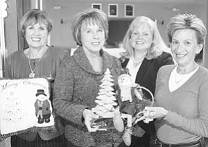 William D. Lewis | The Vindicator: Kids’ Crew committee members preparing for two holiday events to benefit Akron Children’s Hospital Mahoning Valley are, from left, Julie Costas, Donna Hayat, JoAnn Stock and Kathy Dwinnells.