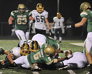 Ursuline's Jesse Curry reaches the ball over the goal line for an early 2nd half TD against Kirtland during their game in Auora on Saturday night. Photo/Mark Stahl