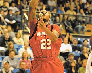 Youngstown State's #22 Devonte Maymon puts up puts up a lay up on a fast break.