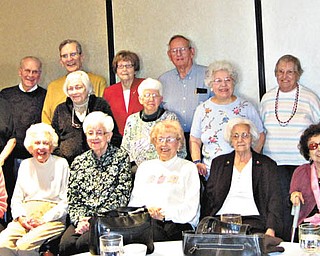 Golden olden days: Recollections of their golden days growing up in Niles were shared by members of Niles McKinley High School Class of 1943 during a luncheon Nov. 9 at Ciminero’s Banquet Centre in Niles. They learned who drove the first cars to school and who ran home for lunch each day. Also discussed were ways in which the world has changed since their school days. Class members have met three times a year for the past 17 years and have kept in touch through their class newsletter. Sharing the nostalgic walk down memory lane are, seated from left, Earlene Negro, Martha Jensen, Lena Fately, Evelyn Blatchford, Mable Pascarzi and Alice Helwig; and standing, Gary Naeser, Norma Jean Parke, Bill Brownlee, Dr. Douglas Evans, Ruth Naeser, Verna Brownlee, Georgia Jones, George John, Mary Ann Luich, Leona Miller, Filomena Donadio, Robert Stoll and Siromani Stoll.