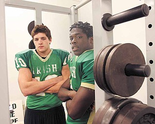 READY FOR THE SACK -  State honored  Jordan Markota and Keil'n Thurston play together and practice together  as Ursuline makes its run for a state championship title.